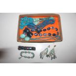 A box of turquoise and other jewellery