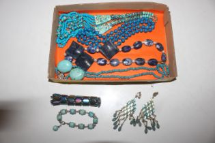 A box of turquoise and other jewellery