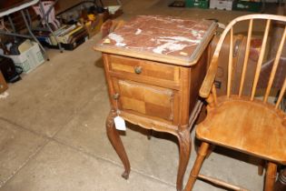 A late 19th century French walnut pot cupboard wit