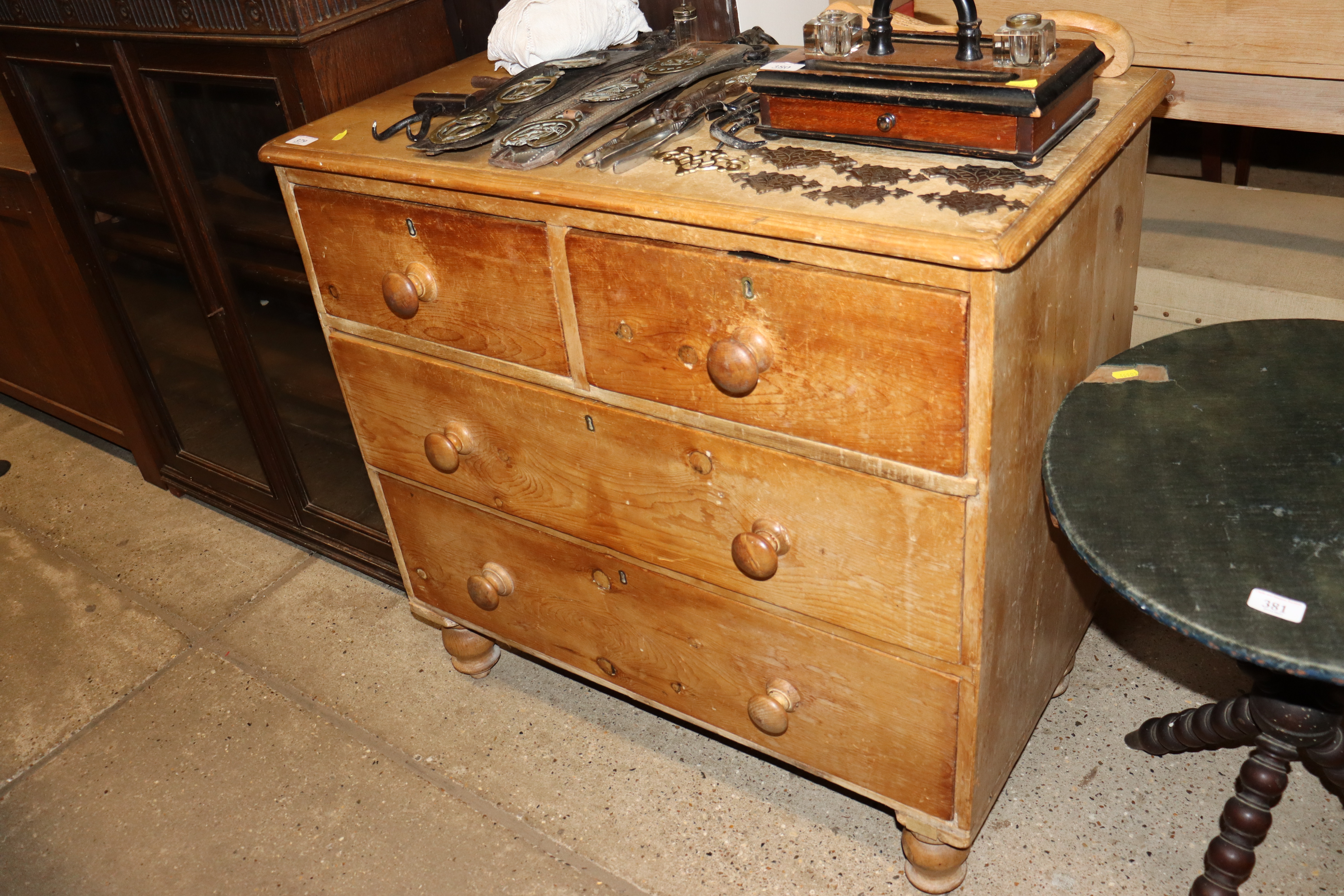 A stripped pine chest fitted two short over two lo