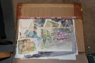 A box containing unframed watercolours, some by E.