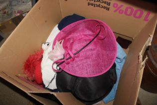 A box of vintage clothes and hats