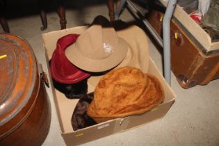 A box of assorted vintage ladies hats, to include