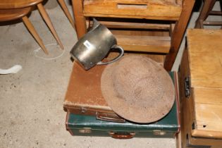 A military helmet, jug and two cases