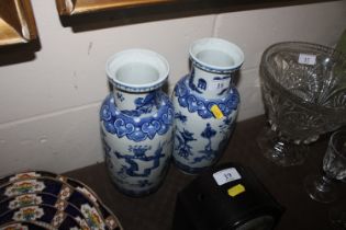 A pair of 19th Century Chinese baluster vases (som