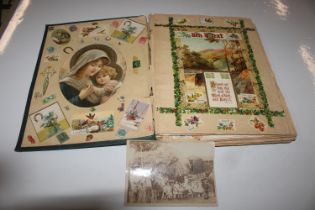 A scrap album and contents including stamps and ci