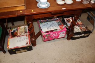 Three boxes of Arsenal football programmes