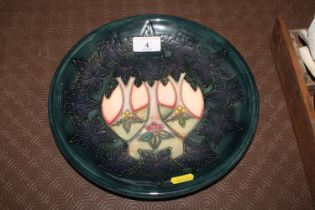 A Moorcroft "Cluny" pattern plate, 26cm dia.