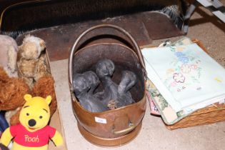 A copper and brass coal helmet and contents of cla