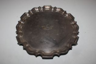 A Goldsmiths Co. silver salver engraved "True To T