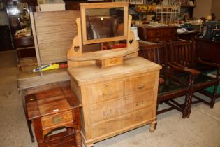 A stripped pine dressing chest fitted two short ov