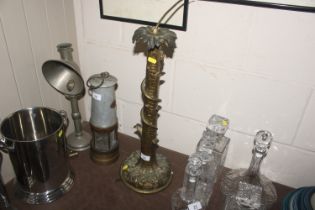 A decorative table lamp base in the form of a serp