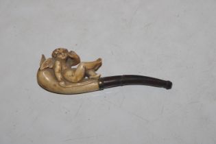 A Meerschaum pipe decorated with cherub AF