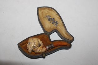 A cased Meerschaum pipe in the form of a head with