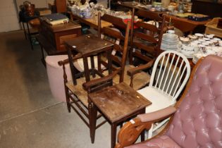 A white painted stick back chair and a pair of lad