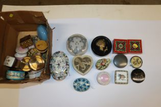 A box containing various trinket boxes, compacts e