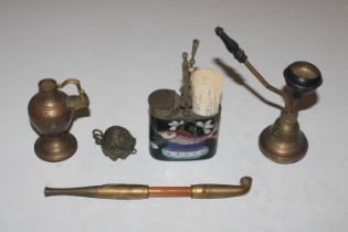 A collection of smoking related items including br
