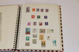 Two albums containing stamps, post-cards, First Da