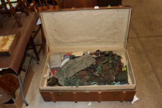 A wooden and leather bound trunk and contents cont