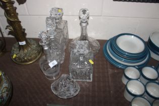 Various cut and etched glass decanters; a ships de