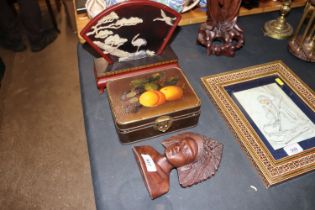 A carved wooden bust; a trinket box with painted s