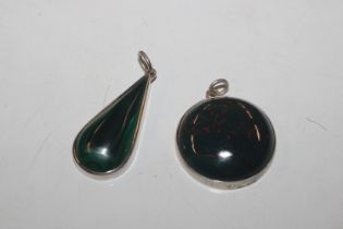 A silver mounted blood stone pendant; and a silver