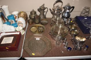 An Eastern pierced copper octagonal tray; a brass