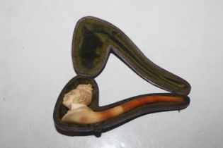 A cased Meerschaum pipe, the bowl in the form of a