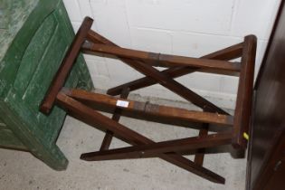 An oak folding luggage stand