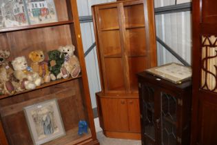 A G-Plan design teak corner display cabinet raised