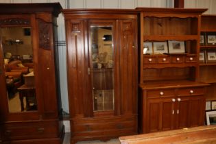 A Edwardian mahogany mirror fronted single door wa