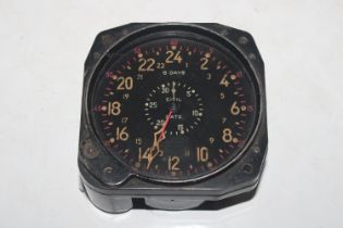 A Waltham US Navy WWII eight day aircraft clock