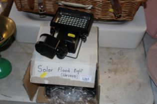 A Solar powered wall mounting flood light as new