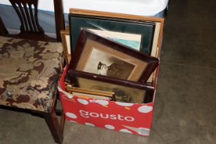 A box of various pictures and prints and two penci