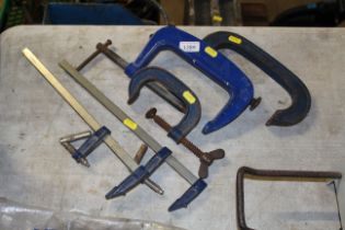 Three various record G Clamps and two other clamps