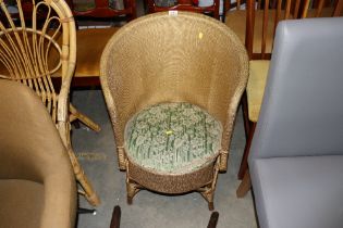 A Loom upholstered tub chair