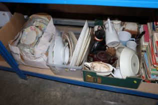 Three boxes containing various patterned teaware,