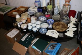 A cast iron base table with smoke glass top