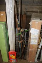 A quantity of long handled garden tools to include