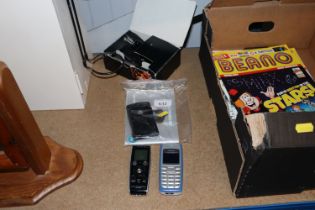 A digital voice recorder and two mobile phones