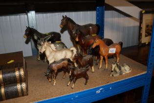 A collection of various horse ornaments