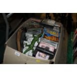 A box of various CD's and other miscellaneous item