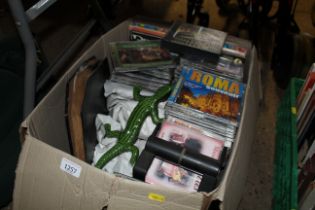 A box of various CD's and other miscellaneous item