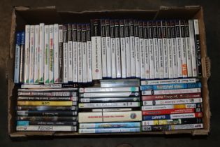 A box of Nintendo Wii, PlayStation and PC games