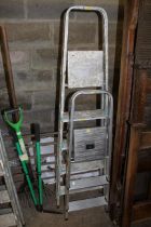 Two aluminium folding step ladders