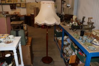 A standard lamp and shade