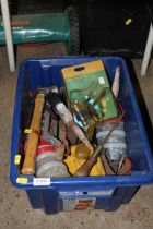 A box containing various tools to include hammer,