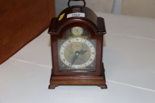 An Elliot Tempus Fugit mantel clock with presentat