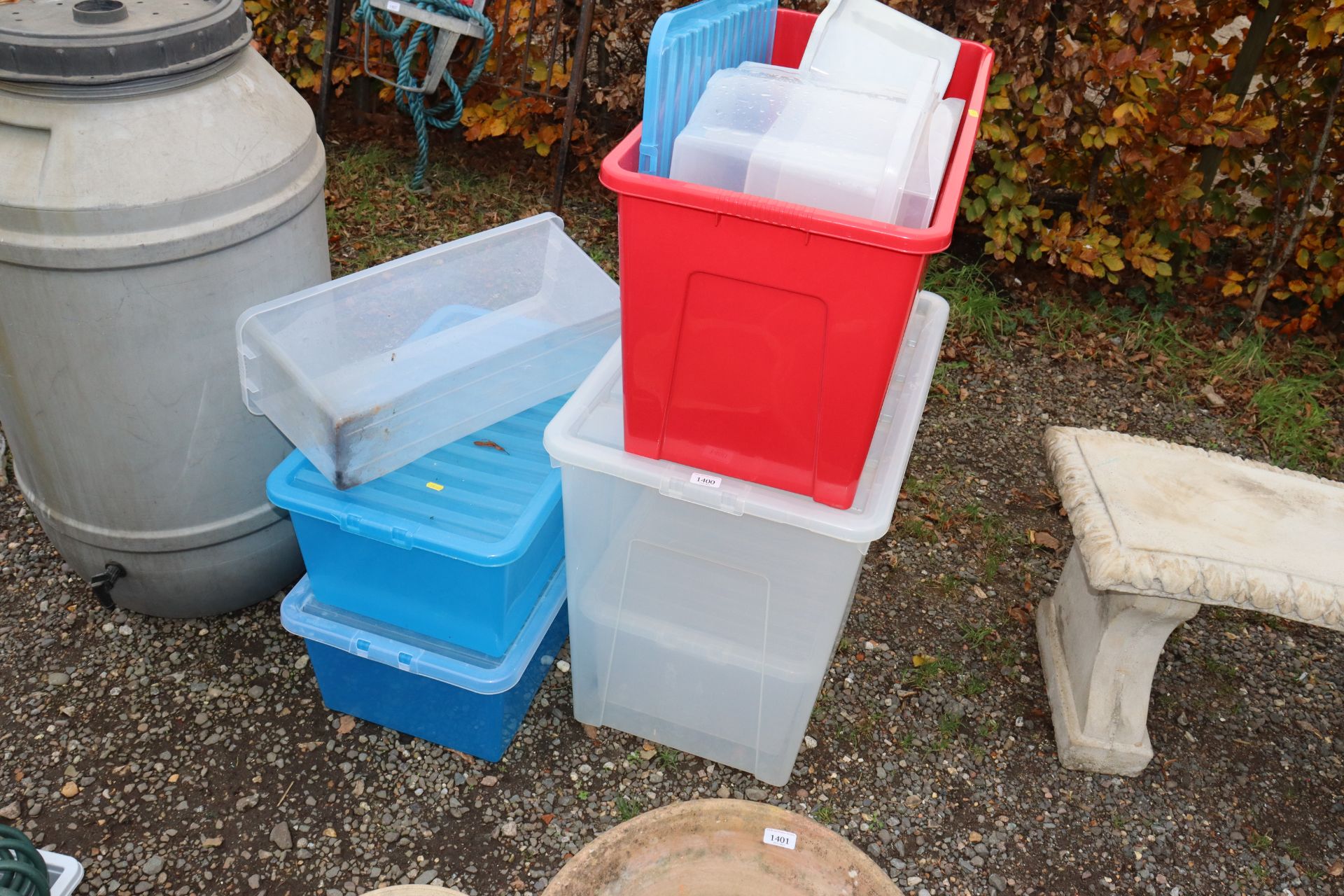 A quantity of plastic storage boxes