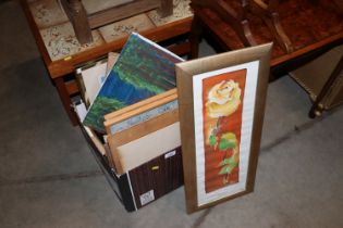 A box of various pictures and prints